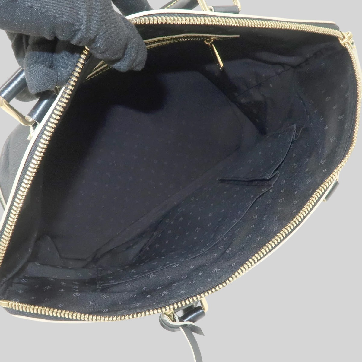 Louis Vuitton Suhari Lock It